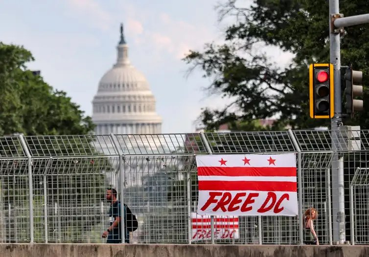 A banner depicting the Washington, D.C., flag with a text reading 